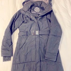 Lululemon winter parka. The hood was sewn on. I detached it. Still zips on.